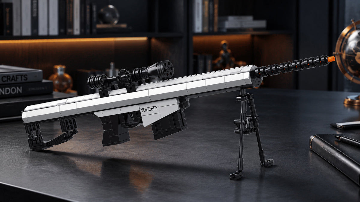 White and black YOUEEFY brick-built rifle model with scope and bipod displayed on a desk