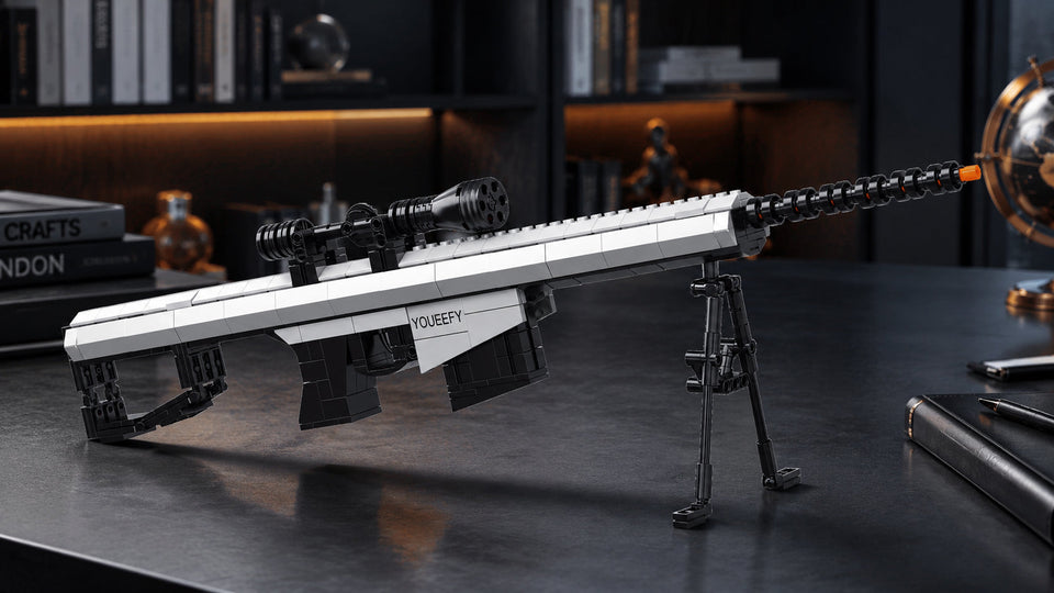 White and black YOUEEFY brick-built rifle model with scope and bipod displayed on a desk