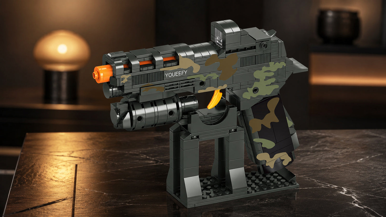 YOUEEFY camouflage Standard-Brick pistol model displayed on a stand