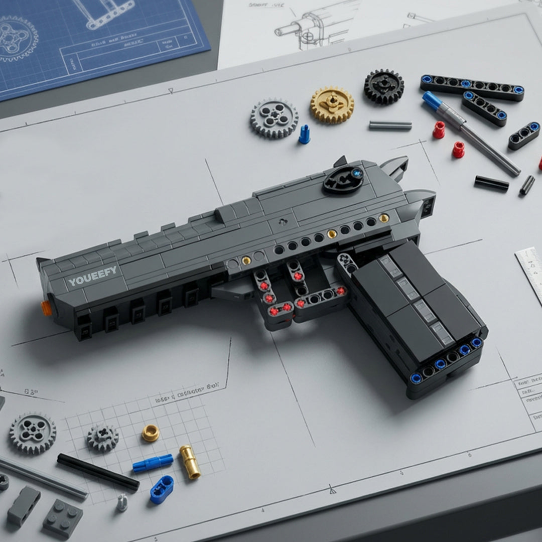 Desert Eagle building block gun model being assembled on a blueprint with loose bricks
